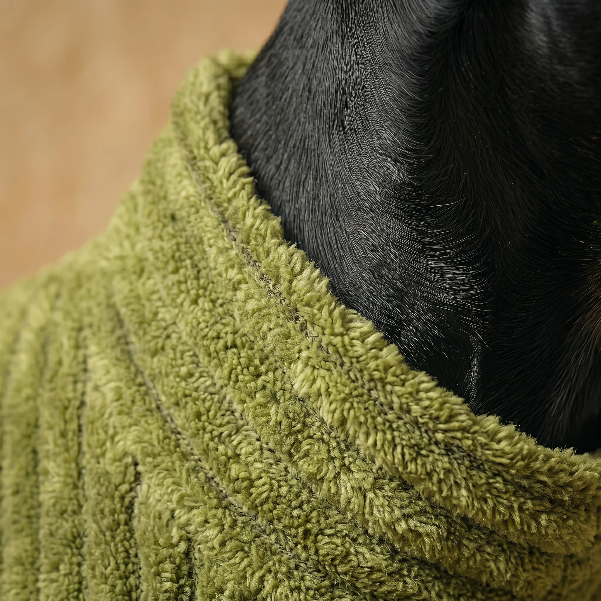 Olive green striped fleece dog sweater for Dobermans, showcasing soft texture and high neck fit on a deep-chested breed, warm core layer in minimalist style.